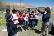 Project WET\'s Pam Justice talks water molecules with the kids