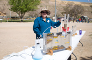 Volunteer Miriam Jones operating a groundwater flow station